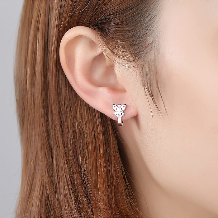 Boucles d'oreilles créoles papillon argentées pour enfants