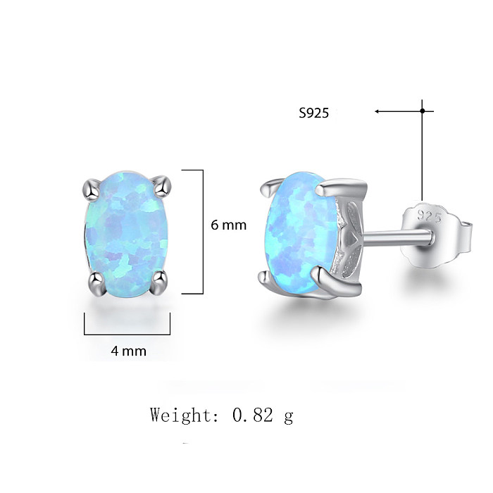 Boucle d'oreille à tige en opale ovale bleue