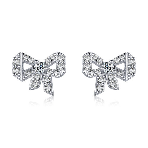 Sterling Silver Lovely Zirconia Bow Stud Earrings