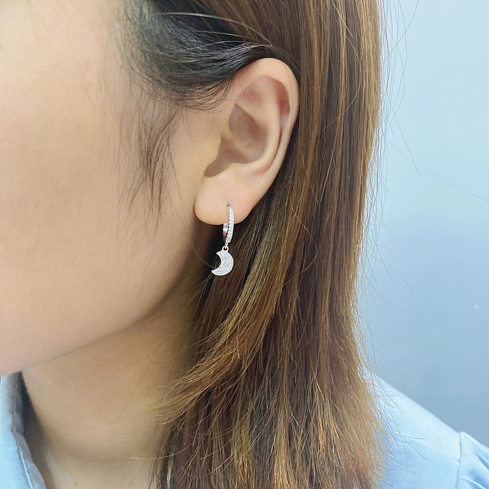 Boucle d'oreille créole lune argentée