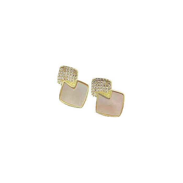 1 paire de clous d'oreilles en diamant artificiel, incrustation irrégulière en cuivre carré de Style INS