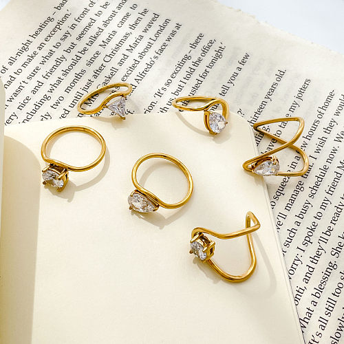 Anéis de zircão embutidos de aço titânio em forma de coração de estilo simples