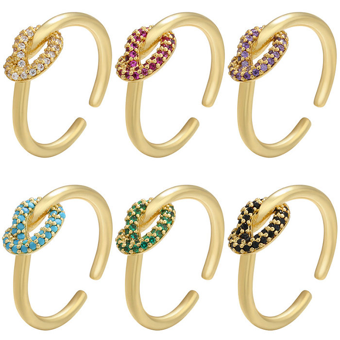 18 Karat vergoldeter Ring mit geknoteten, gedrehten farbigen Diamanten und Mikroeinlagen
