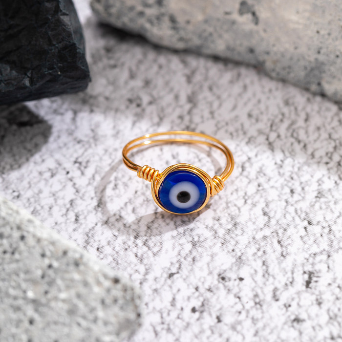 Unregelmäßige runde Teufelsauge-Verkupferungs-Inlay-Acryl-Türkis-Opal-Ringe im ethnischen Stil, 1 Stück