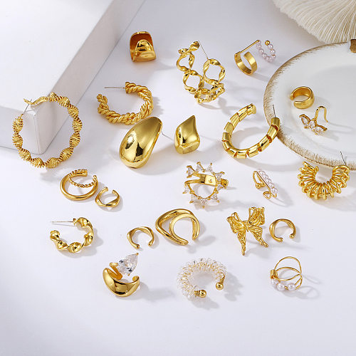 Goldene Retro-Diamant-Wassertropfen-Ohrringe mit gedrehtem Zirkon