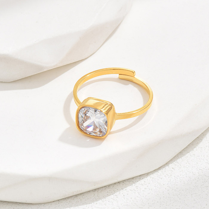 Eleganter, schlichter, glänzender, runder, quadratischer, offener Ring aus Edelstahl mit Zirkoneinlage und 18-karätiger Vergoldung