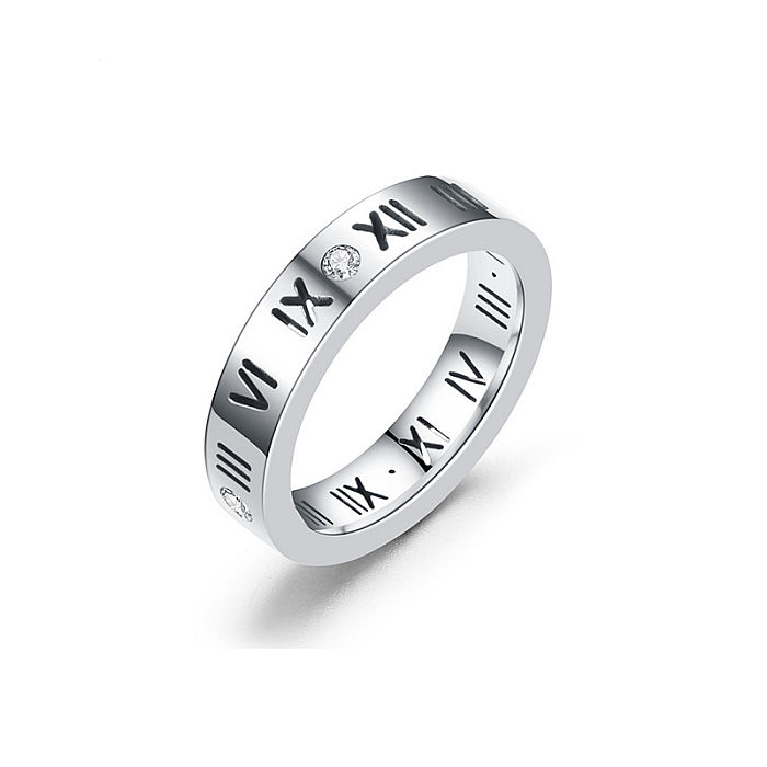 Lässiger schlichter Stil mit Nummern-Titan-Stahlbeschichtung, ausgehöhlter Inlay-Zirkon-Ring