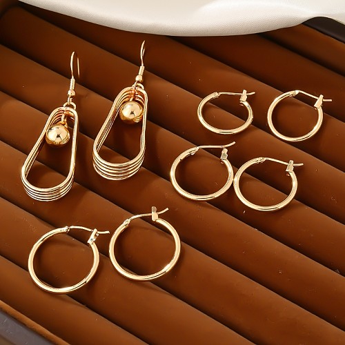 1 paire de boucles d'oreilles rondes en cuivre plaqué or, décontractées, géométriques douces