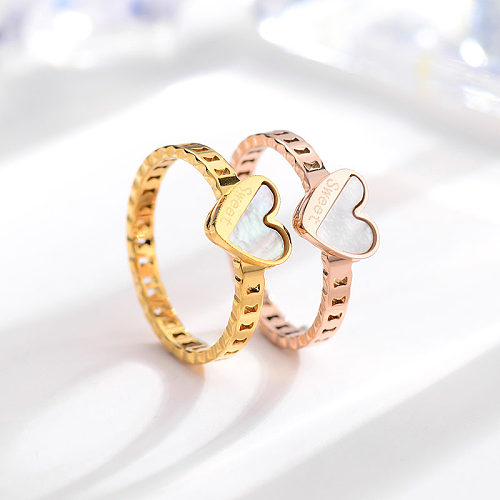 Anéis de retalhos de aço titânio em formato de coração de estilo simples