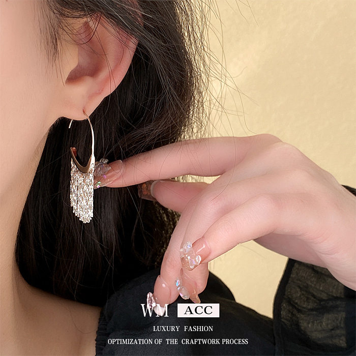 1 Paar Damen-Streetwear-Ohrringe mit geometrischem Kupferquastenmuster
