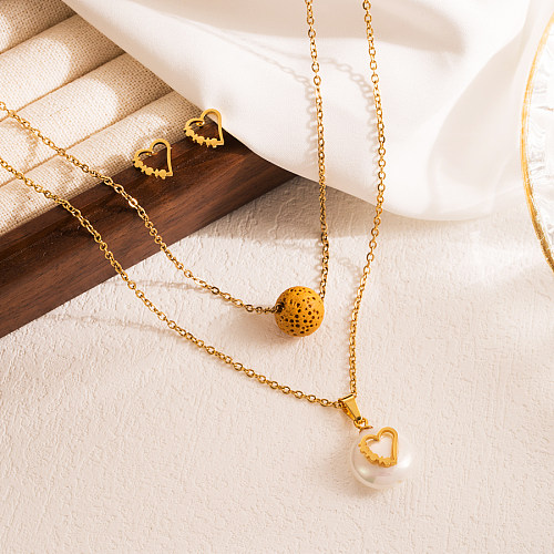 Elegante Herzform-Schlüssel-Edelstahl-Perlenbeschichtung mit vergoldeten Ohrringen und Halskette