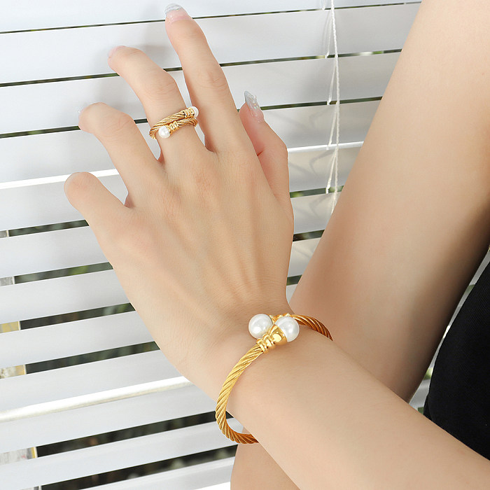 Pendientes plateados oro titanio de las pulseras de los anillos del acero 18K del color sólido del estilo simple al por mayor