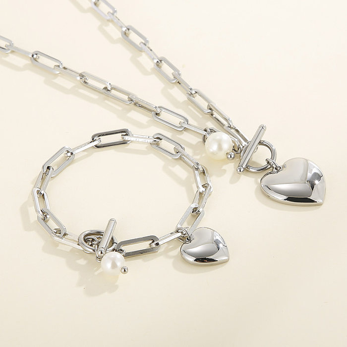 Moda de aço inoxidável pêssego coração OT fivela colar pulseira conjunto jóias por atacado