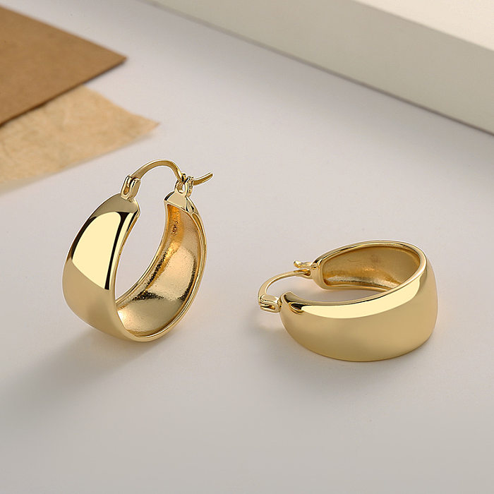 1 par de brincos elegantes banhados a ouro em latão redondo