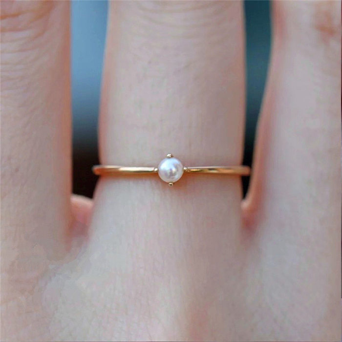 Anéis de pérolas artificiais folheados a ouro de cobre geométrico de estilo simples