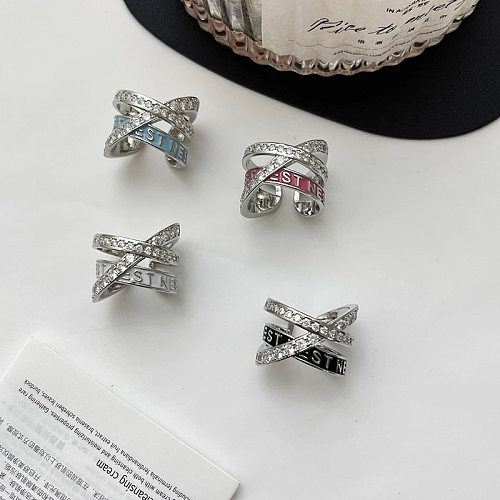 Anillos abiertos de diamantes de imitación con incrustaciones de esmalte de cobre con letra cruzada de viaje de estilo simple
