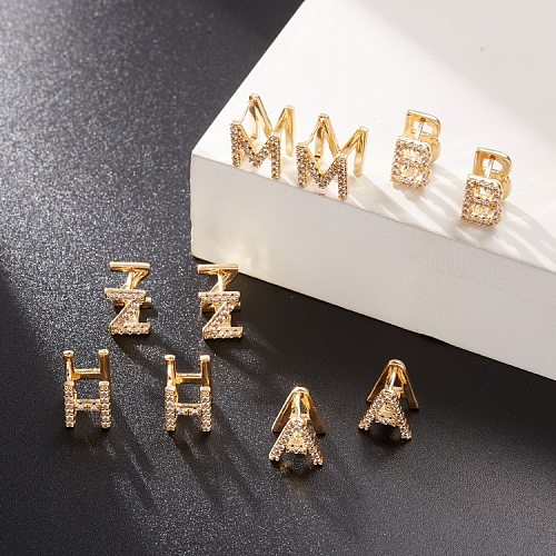 Modische Ohrstecker mit Buchstaben-Kupfer-Beschichtung, ausgehöhltes Inlay, Zirkon, 1 Paar