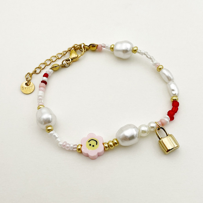 Cute Pastoral Smiley Face Flower Lock Stainless Steel Beaded Imitation Pearl Plating Gold Plated Bracelets Necklace