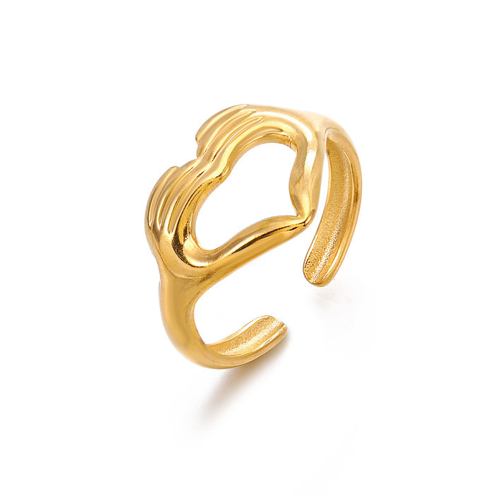 Einfacher offener Ring in Herzform aus Edelstahl in Handform in loser Schüttung