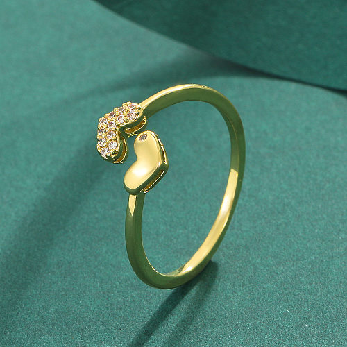 Modischer, herzförmiger offener Ring mit Kupferbeschichtung und Strasssteinen