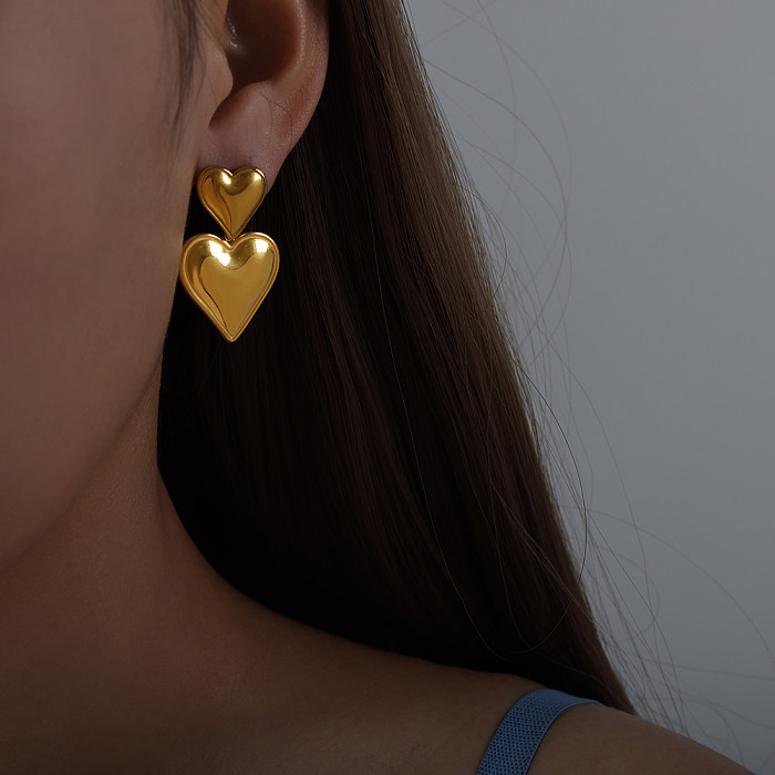 Collier de boucles d'oreilles plaqué or 18 carats en acier titane en forme de coeur doux pour dame