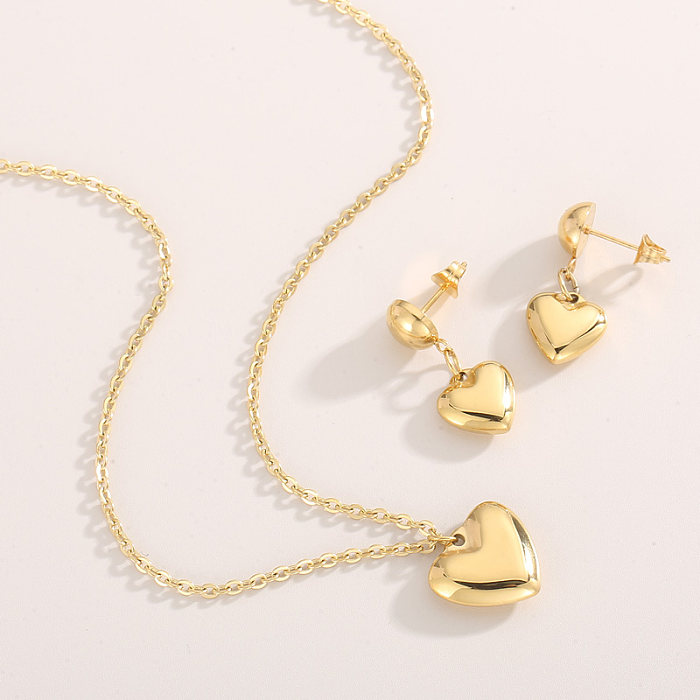 Herzförmige Armbänder, Ohrringe und Halskette im modernen Stil mit Titanstahlbeschichtung und 18-Karat-Vergoldung