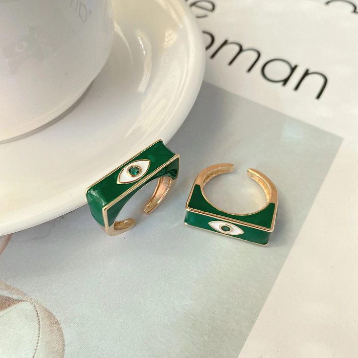 Neuer offener Ring aus verkupfertem 18-karätigem Gold mit Augentropfen-Öl und mikroverkrustetem Diamant