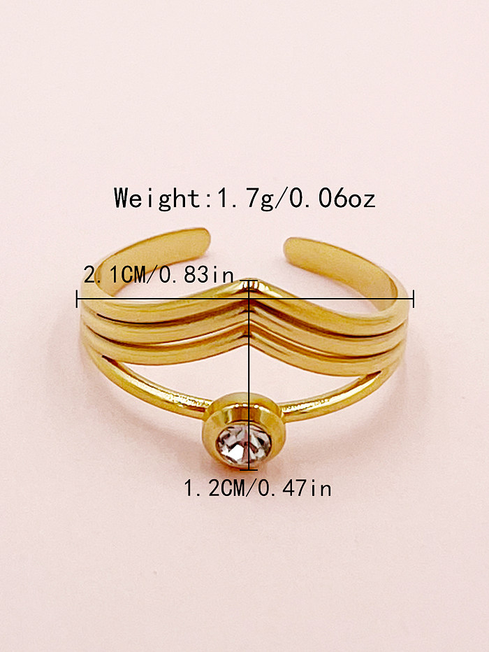 O estilo simples elegante alinha o anel aberto chapeado ouro de aço inoxidável do zircão no volume