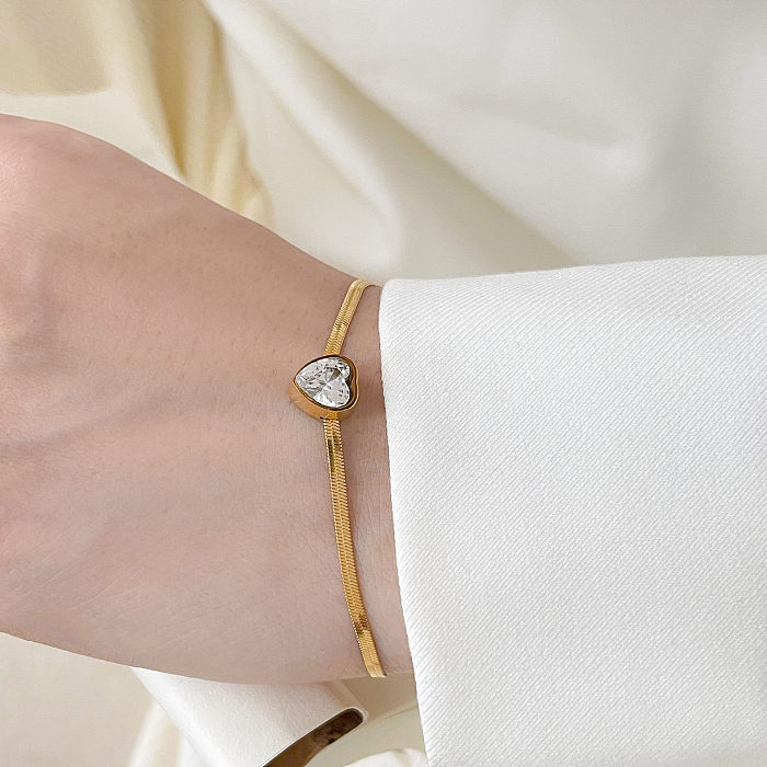 Bracelet de cheville de bracelets de Zircon d'incrustation d'acier de titane de forme de coeur de style simple