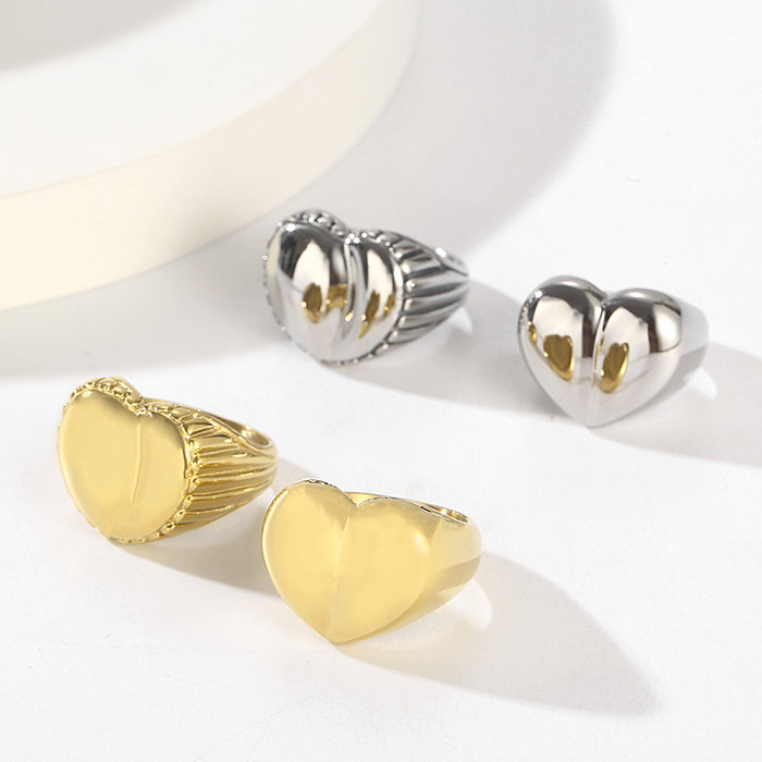 Anillos chapados en oro de 18 quilates con revestimiento de acero de titanio en forma de corazón de estilo simple