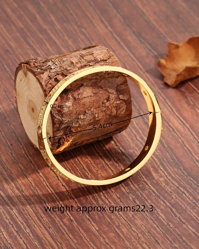 Brazalete chapado en oro de 18 quilates con incrustaciones de cobre redondo de estilo moderno informal