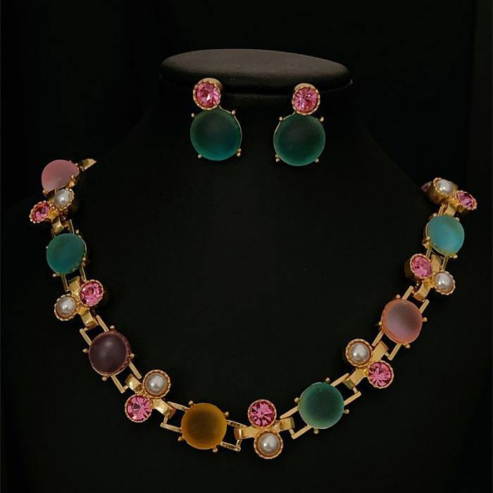 Elegante conjunto de joyas de circonio con incrustaciones de acero chapado en tortuga dulce