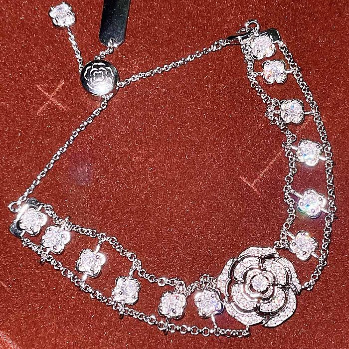 Luxuriöse Wassertropfen-Blume, Kupfer-Diamant, künstliche Edelsteine, Damen-Armbänder, Ohrringe, Halskette