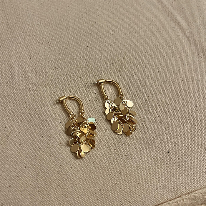 1 paire de boucles d'oreilles pendantes en cuivre plaqué en forme de U pour dame