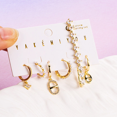 Elegante herzförmige Schlüsselschloss-Kupfer-Ohrringe mit 14 Karat vergoldetem Zirkon in großen Mengen