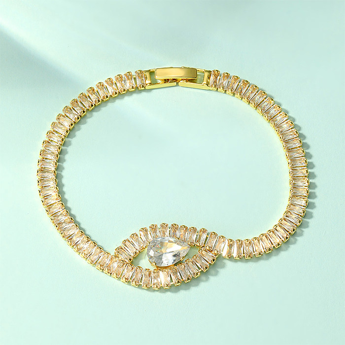 El oro blanco plateado oro 18K del cobre XNUMXK del ojo brillante del estilo simple lujoso plateó las pulseras plateadas del Zircon a granel