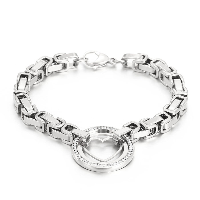 Collier élégant de bracelets de diamant artificiel d'incrustation d'acier de titane de forme de coeur rond élégant
