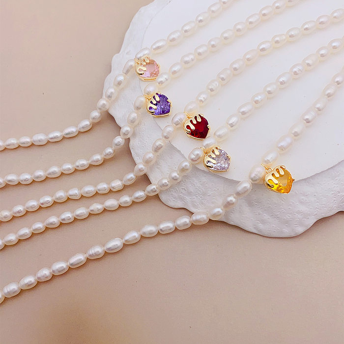 Collier pendentif en Zircon avec incrustation de perles en cuivre en forme de cœur de Style Simple