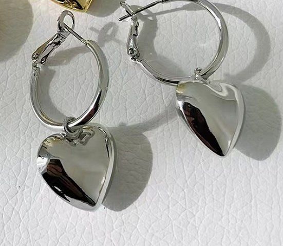 1 Paar Damen-Ohrringe aus Kupfer in Herzform