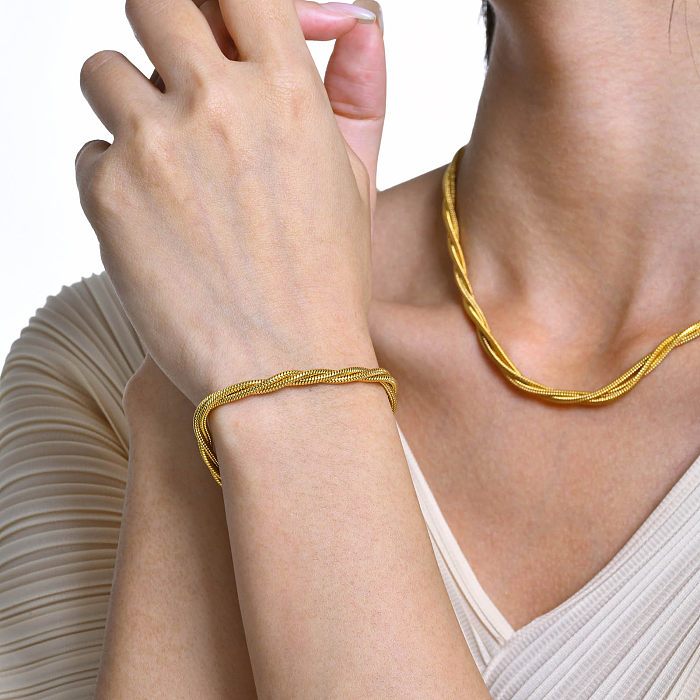 Collar plateado oro simple de las pulseras del chapado en acero inoxidable de la torsión del estilo