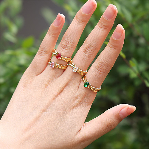 Elegante, glänzende, ovale, kreuzförmige, offene Ringe mit Inlay aus Zirkon und 18 Karat vergoldetem Edelstahl