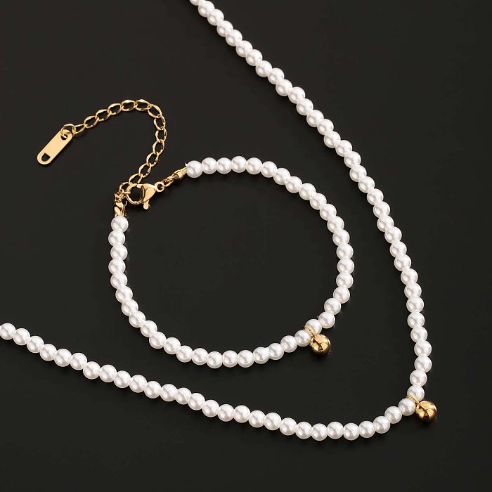Collier de bracelets plaqués or de placage d'acier de titane de perle artificielle ronde de style simple
