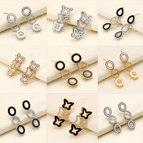 1 paire de boucles d'oreilles pendantes, Style Vintage, Style Simple, nœud ovale, incrustation de cuivre et Zircon plaqué or 18 carats