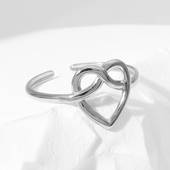 Anéis abertos de chapeamento de aço de titânio em formato de coração de estilo simples por atacado