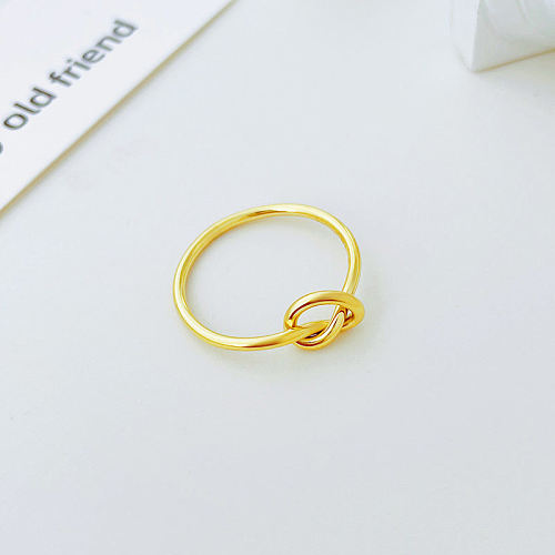 Anéis banhados a ouro 14K irregulares de aço titânio com nó de arco de estilo simples