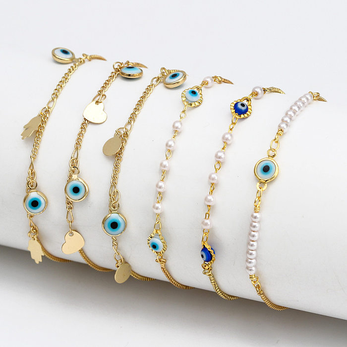 Fashion Geometric Devil'S Eye Heart Shape Copper Artificial Pearls Bracelets