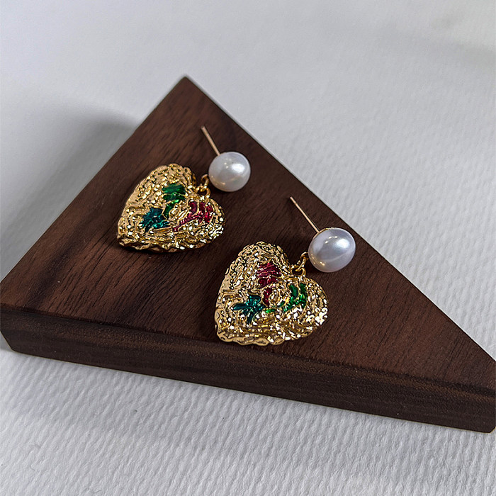 1 paire de boucles d'oreilles élégantes rétro en forme de cœur plaquées cuivre plaqué or 18 carats