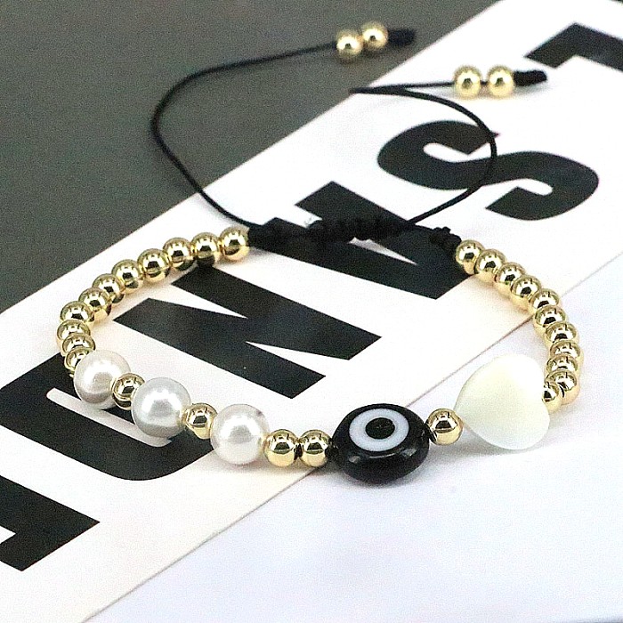 Hip-Hop redondo forma de corazón ojo imitación perla cuerda cobre con cuentas chapado en oro pulseras de concha 1 pieza