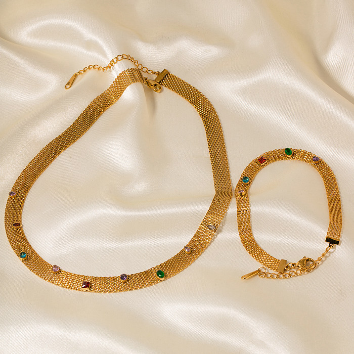 Moderne, farbenfrohe Halskette mit Intarsien aus Edelstahl und 18 Karat vergoldeten Armbändern