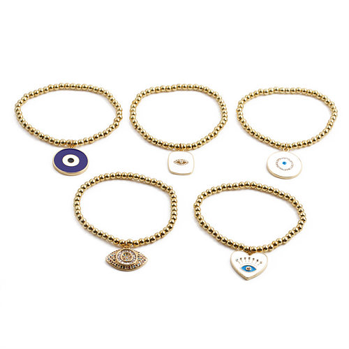 Bracelet élastique en cuivre incrusté de Zircon, bijoux à main transfrontaliers européens et américains, yeux du diable, perle ronde